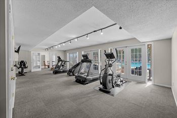 Spacious gym with a variety of exercise equipment